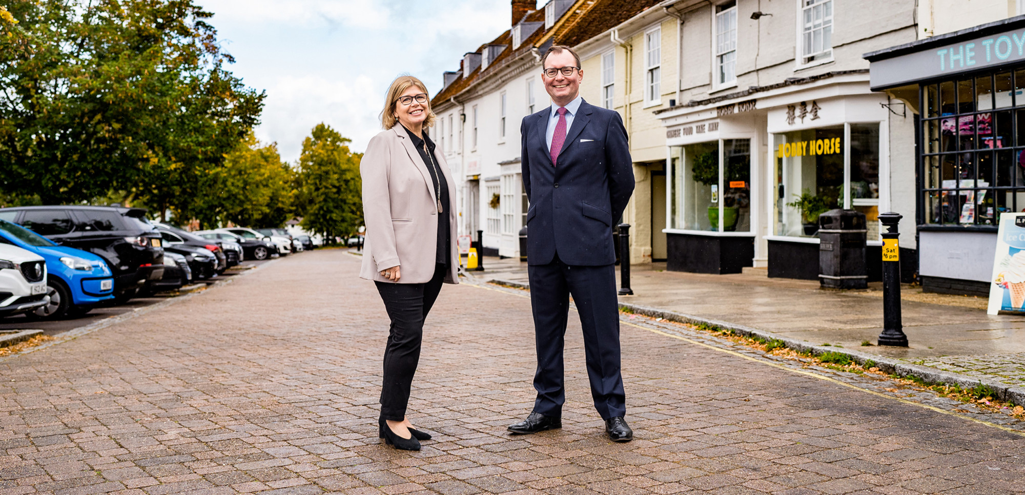 Paul Willans and Nicky Mowat standing in the centre of Alresford, Hampshire