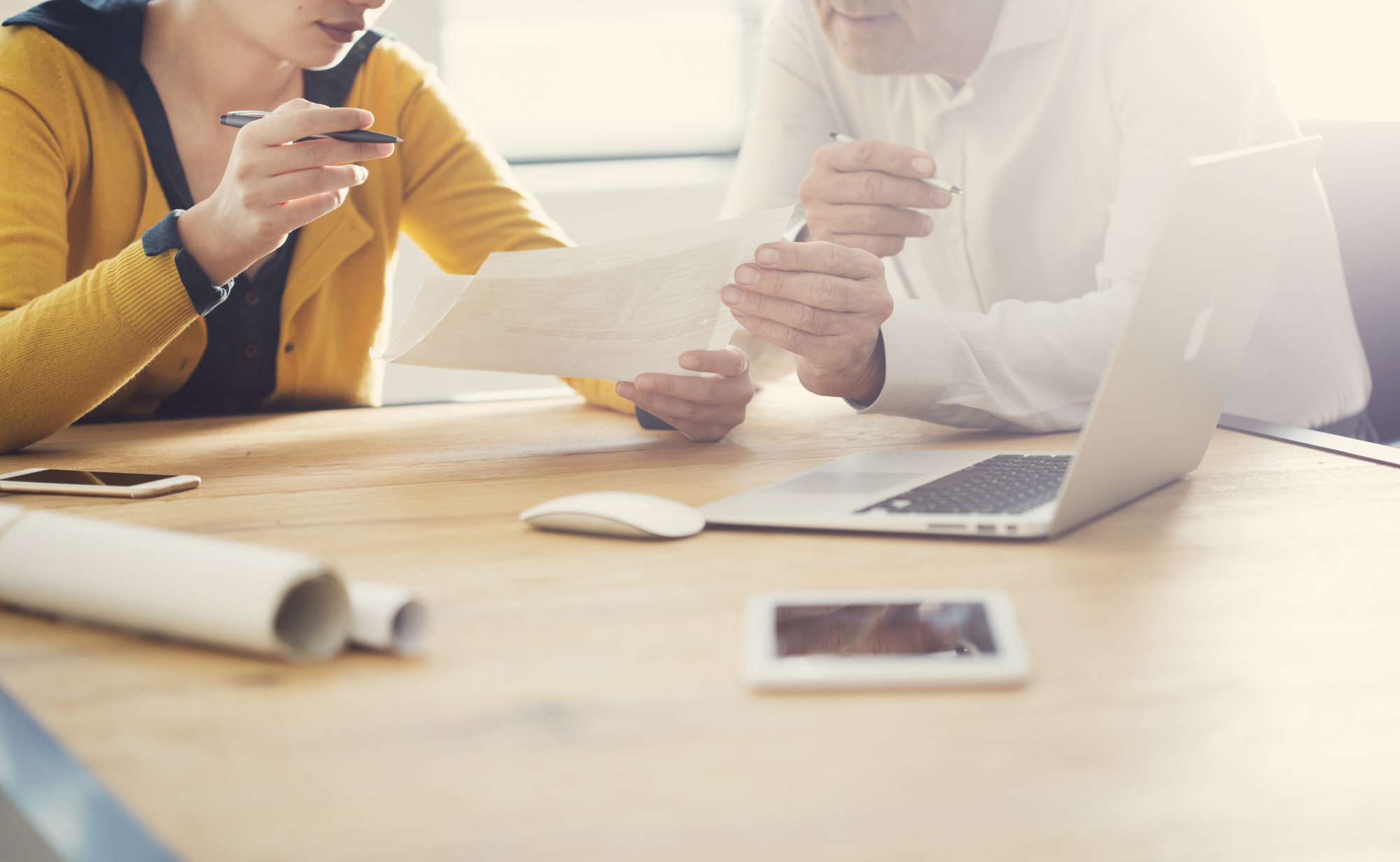 A woman in discussion with her investment advisor or wealth manager