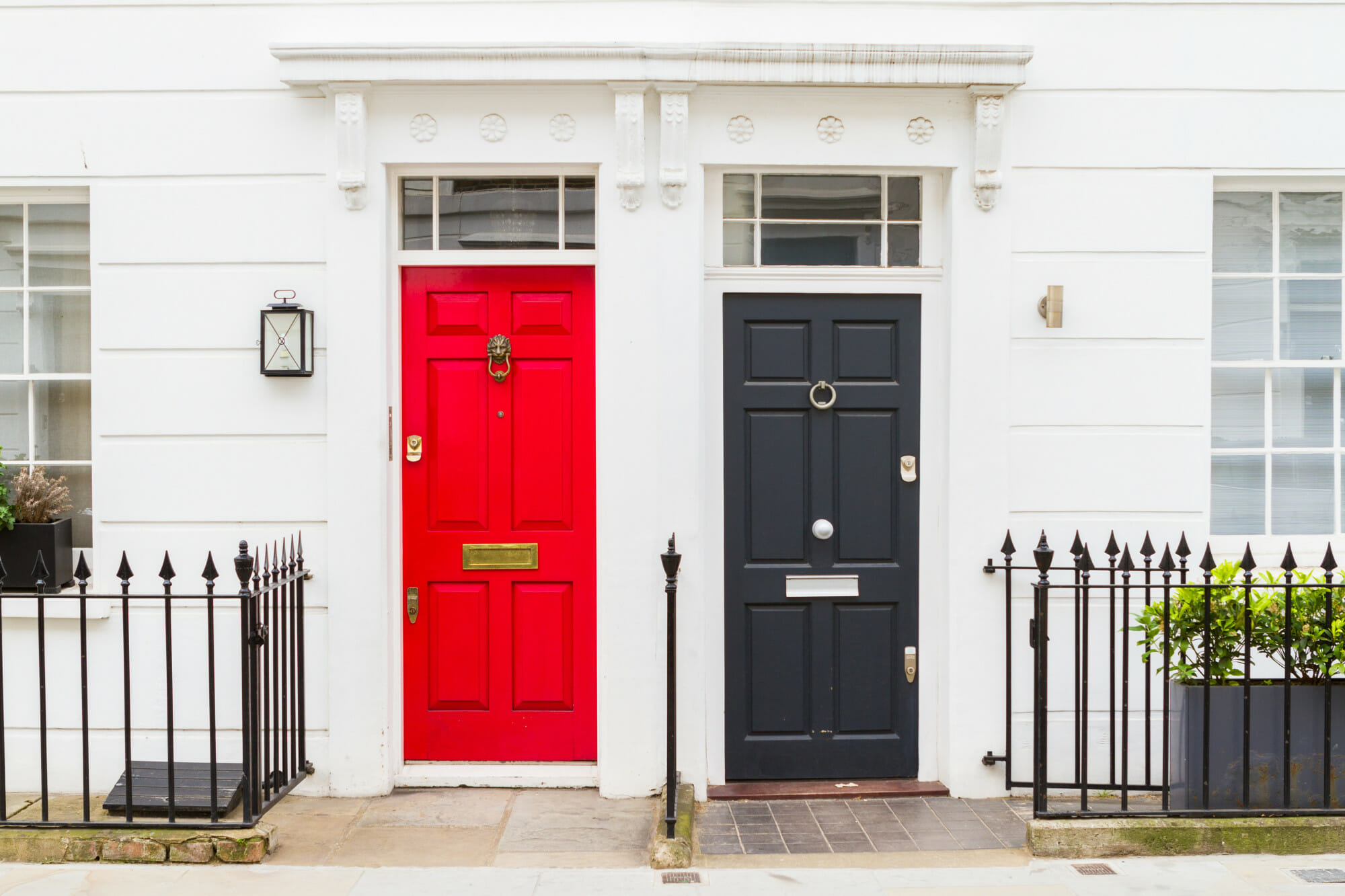 Like a financial adviser and a wealth manager, these two smart front doors in a Georgian terrace look pretty similar, but what are the houses like inside?